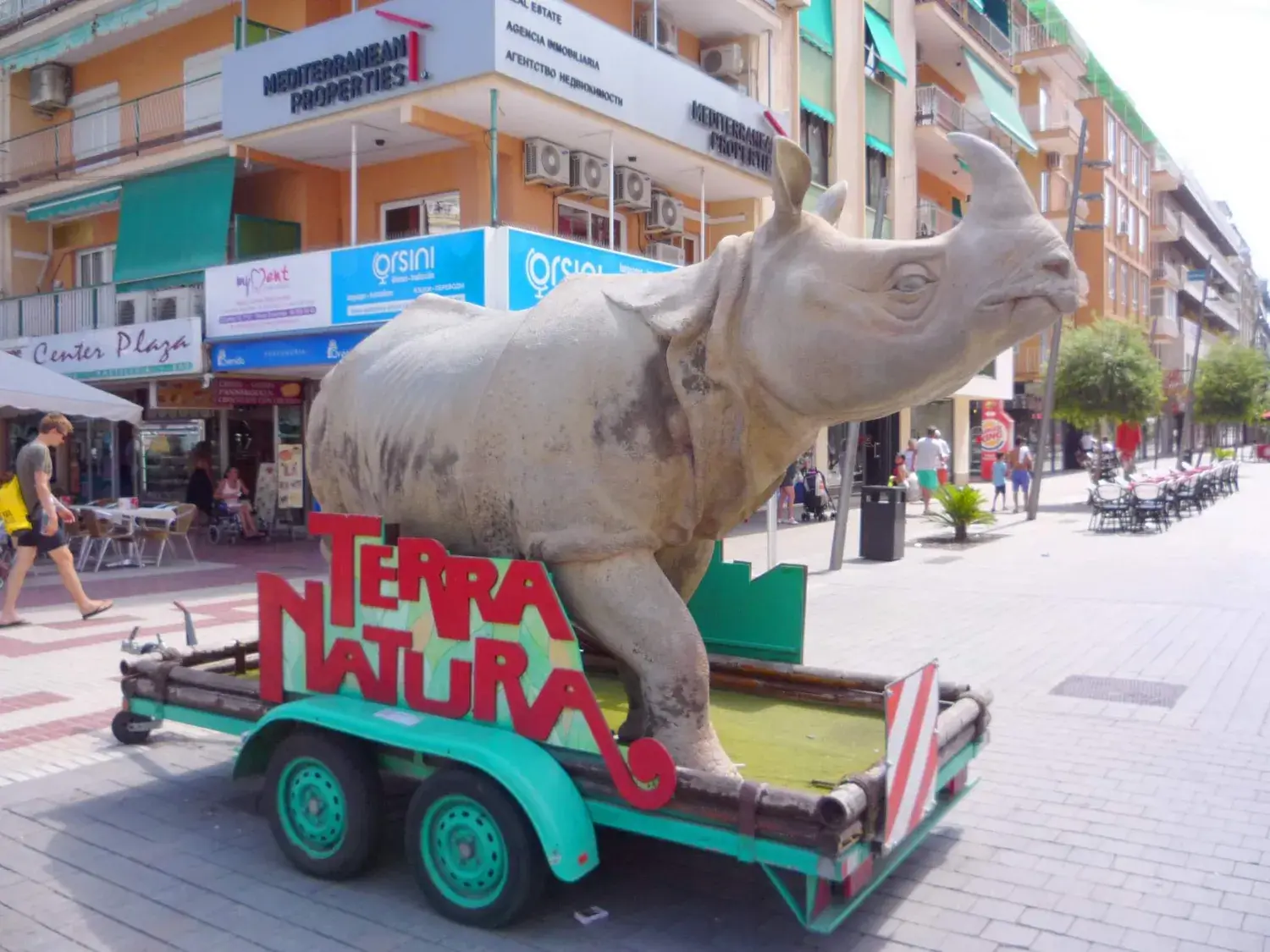 Rhino-shaped promotional float in Terra Natura colours on a Benidorm street