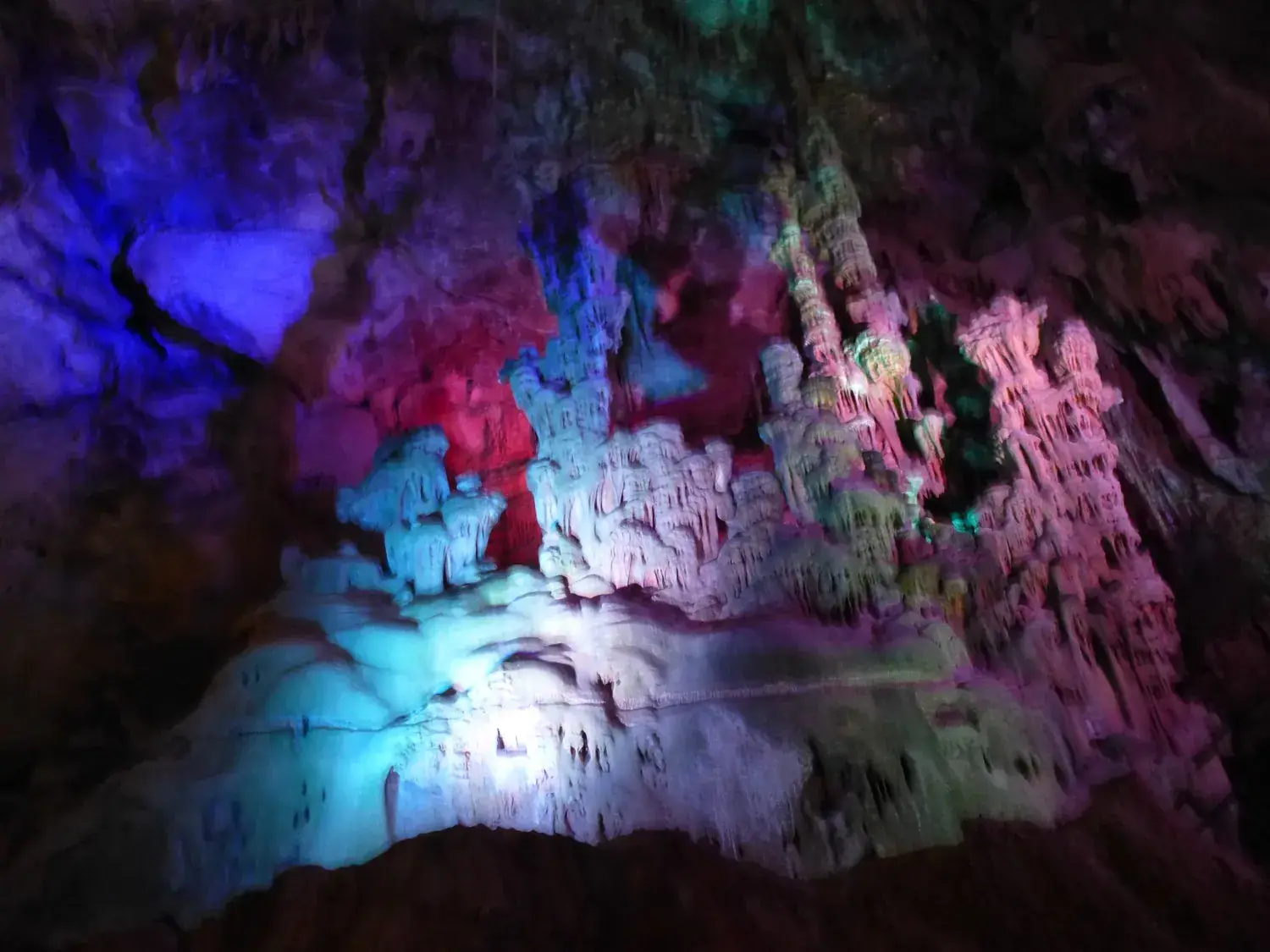 Colour-lit formations inside the Canelobre caves
