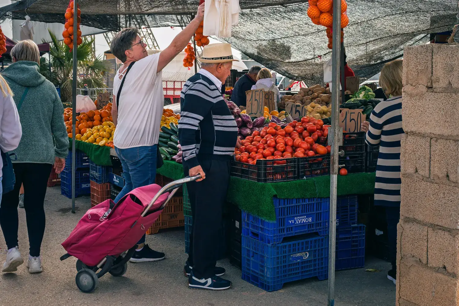 Shoppers between the stalls of Guardamar’s weekly market