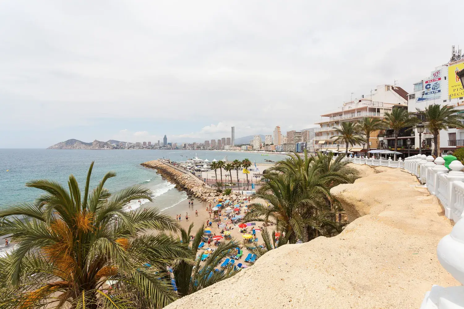 The long Poniente beach in Benidorm, with its towers and turquoise sea