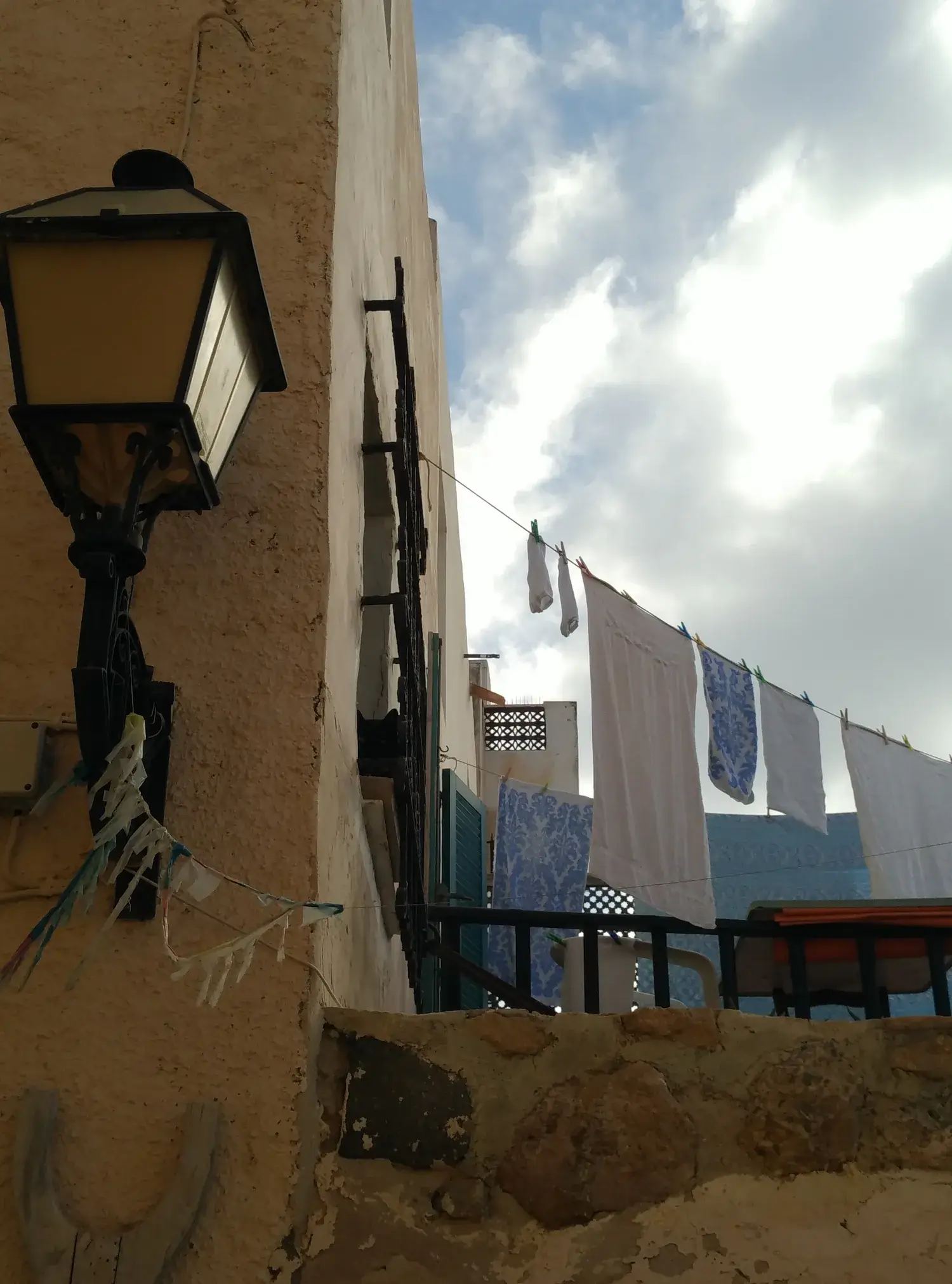 Colourful washing drying in a sunny lane on Tabarca