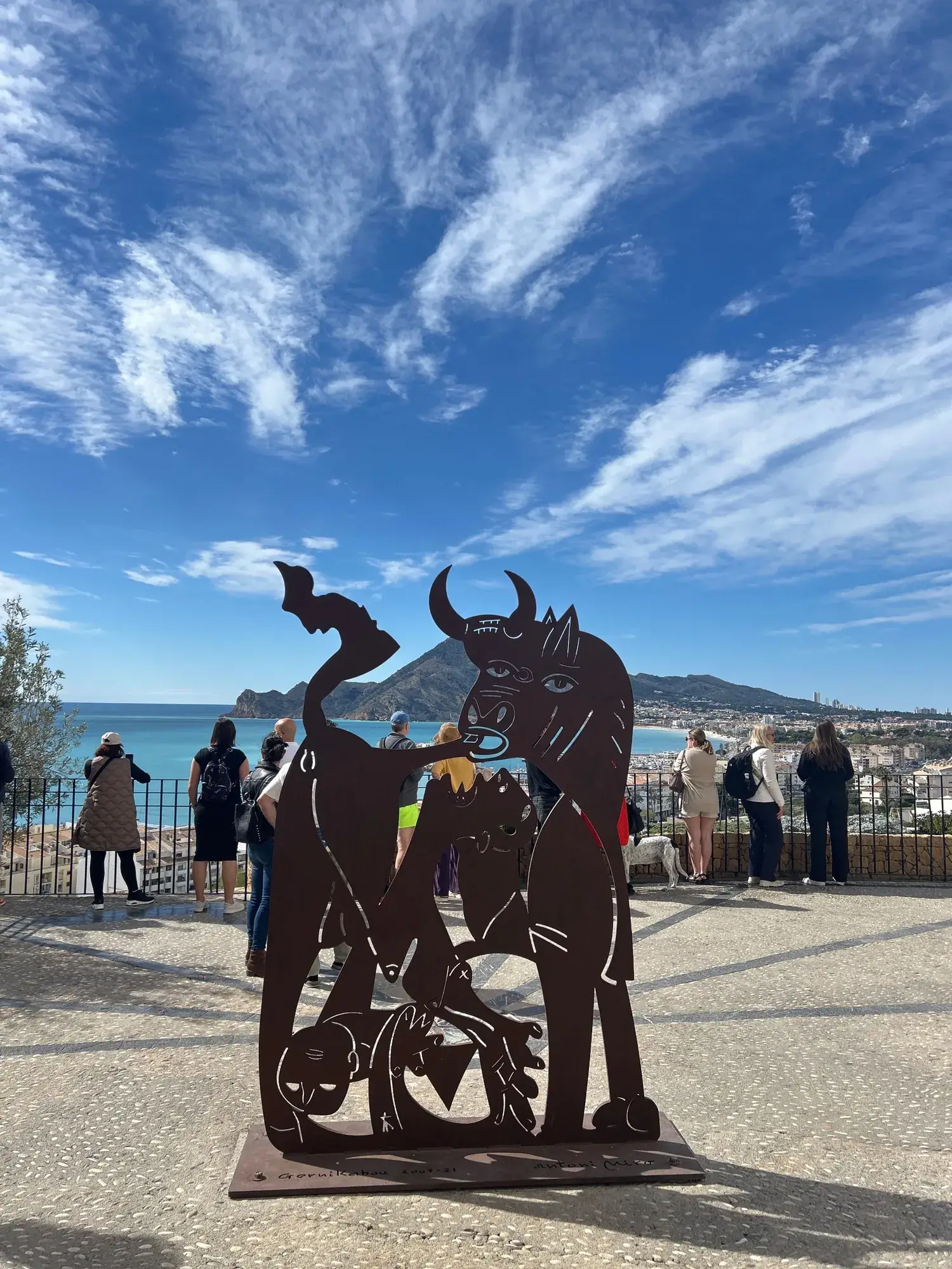 Metal sculptures on the Altea viewpoint with the sea behind