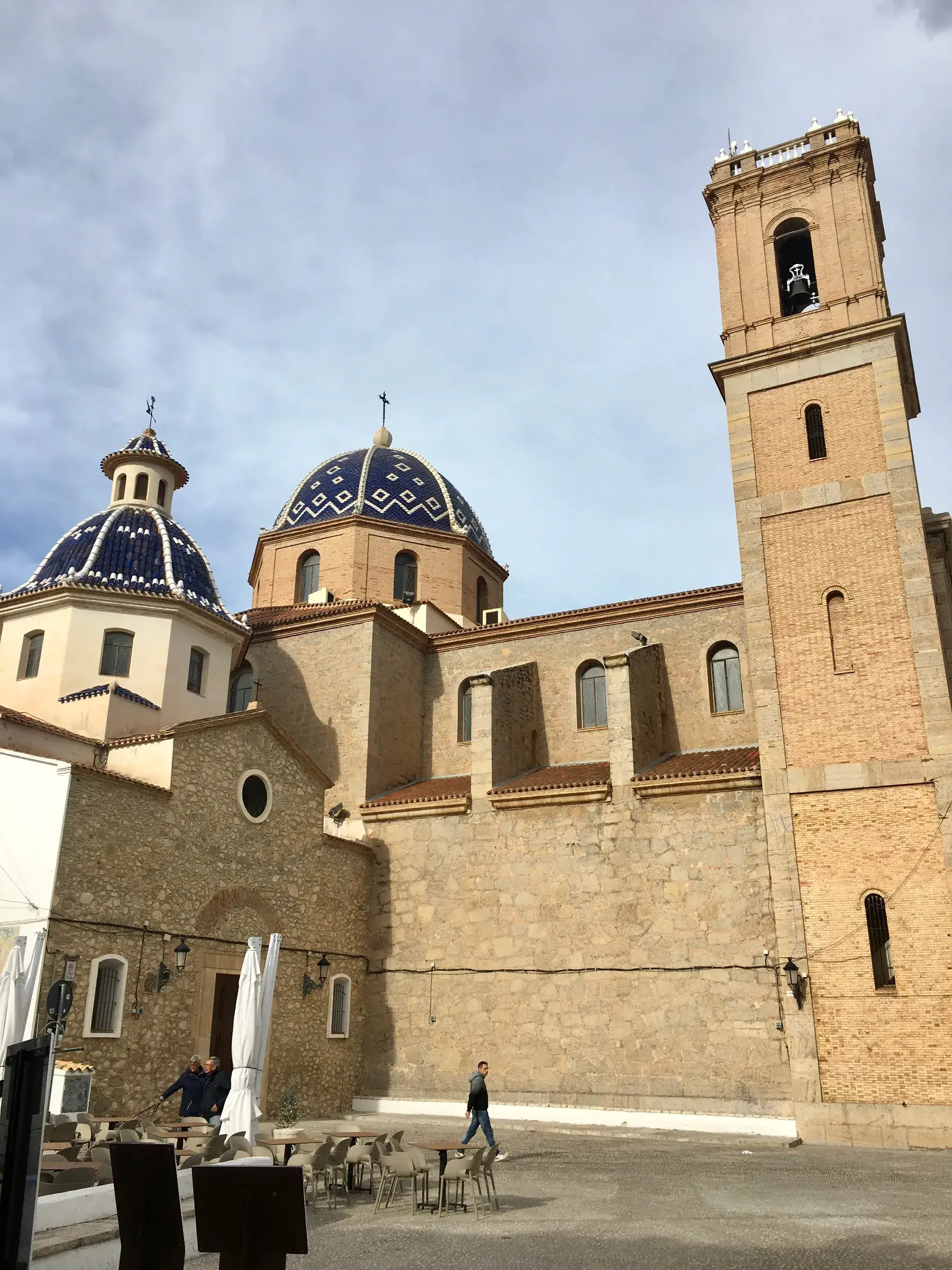 The blue and white ceramic domes of Altea’s church under a bright sky